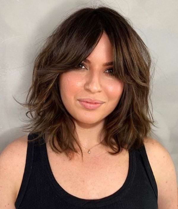 Shag-Frisur mit Curtain Bangs