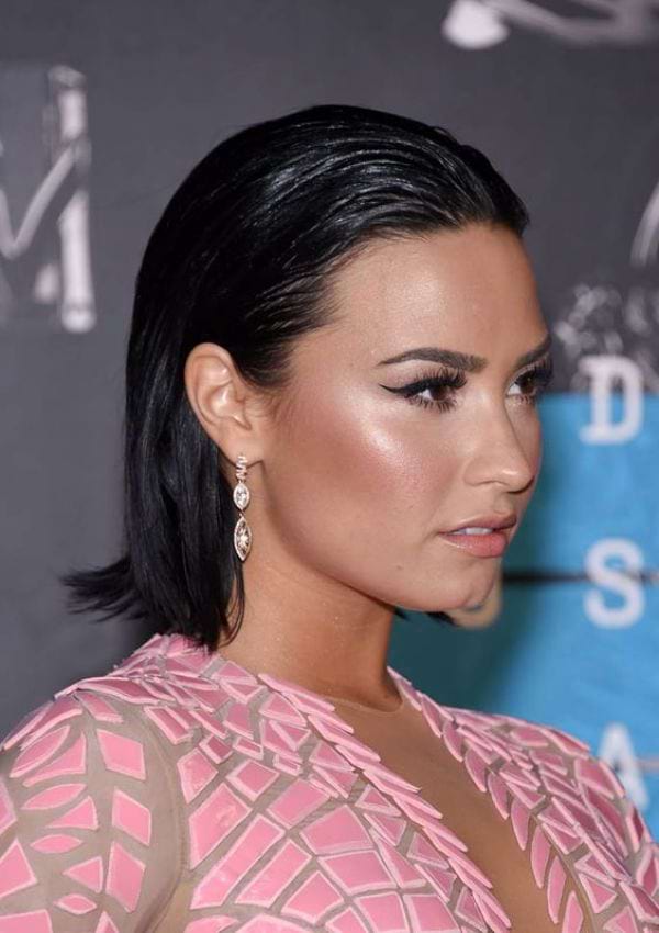 Frisuren mit Locken & Sleek Look